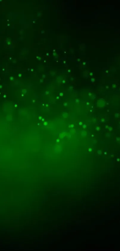 A glowing green abstract mobile wallpaper with ethereal light sparkles.