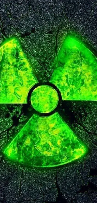 Glowing green radioactive symbol on dark background.