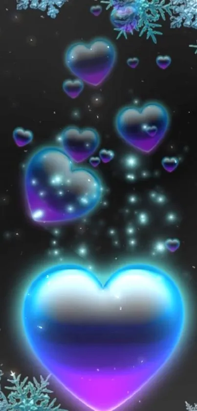 Mobile wallpaper with glowing hearts and snowflakes on black background.