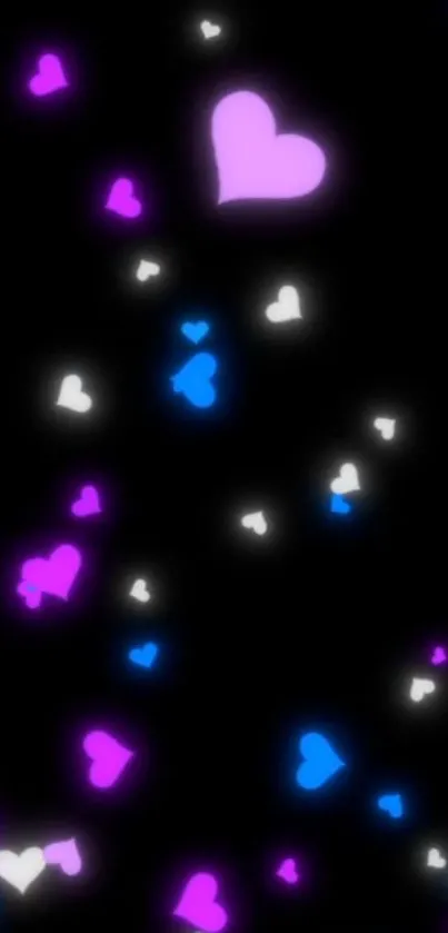 Mobile wallpaper featuring glowing pink, blue, and white hearts on a black background.