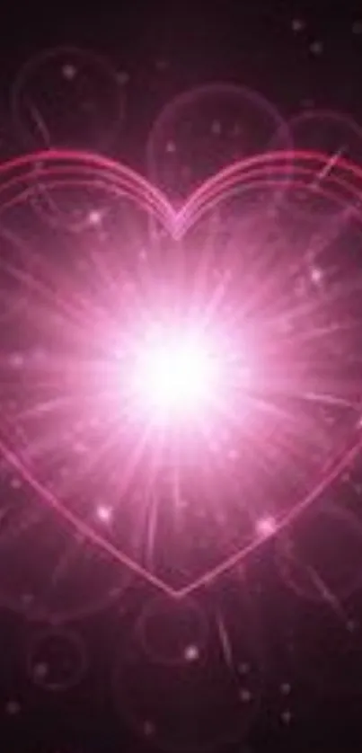 Glowing pink heart with radiant light effect.