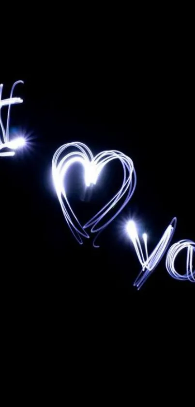 Glowing 'I Love You' text on black background wallpaper.