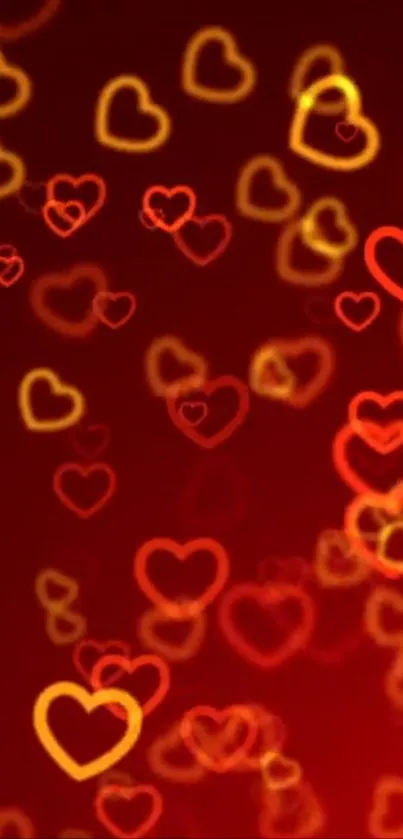 Glowing red and orange heart pattern background.