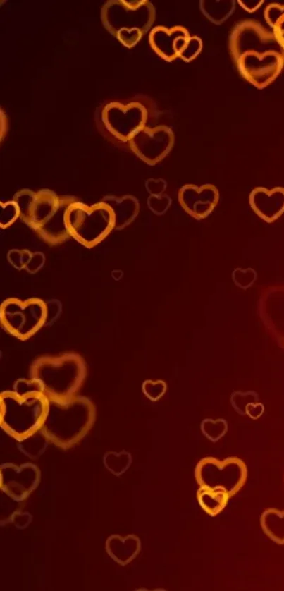 Mobile wallpaper with glowing orange hearts on a dark background.