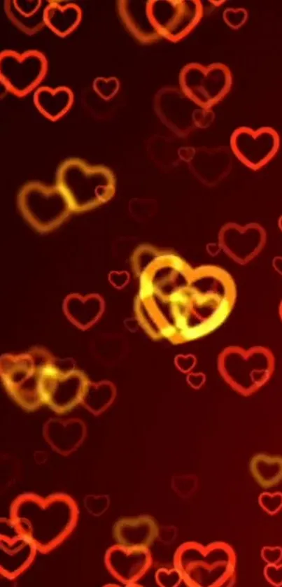 Mobile wallpaper with glowing red and yellow hearts on a dark red background.