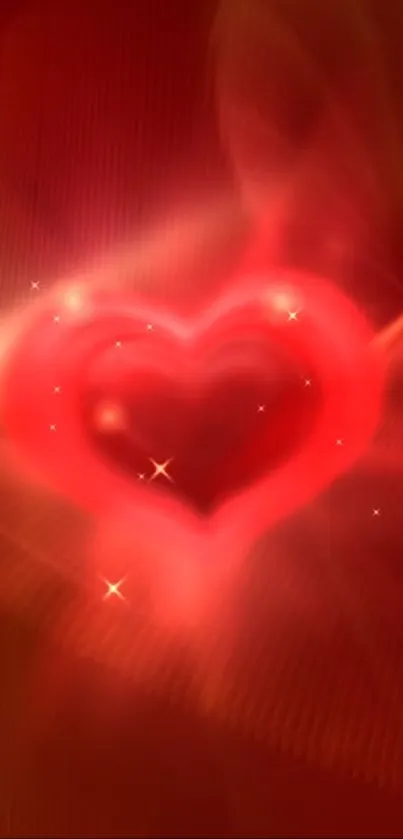 Vibrant glowing red heart wallpaper with sparkles.