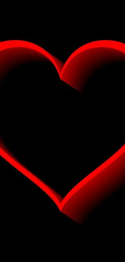 Vivid red glowing heart on black background.