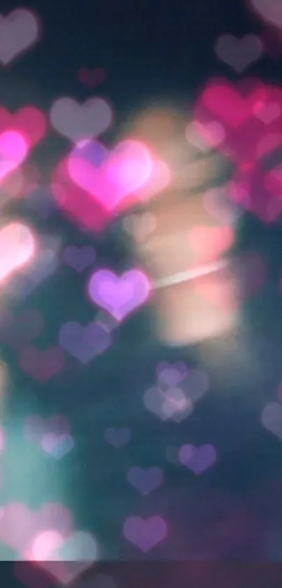 Dreamy bokeh hearts in pink and purple hues on a dark background.