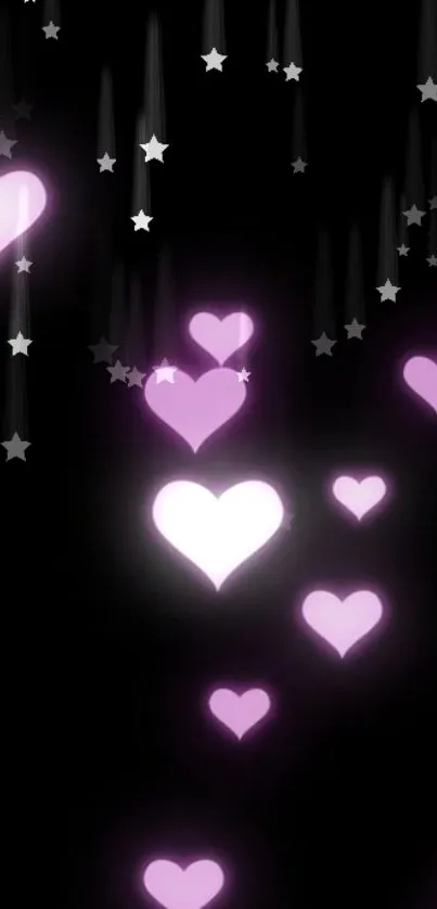 Glowing pink hearts and stars on a black background.