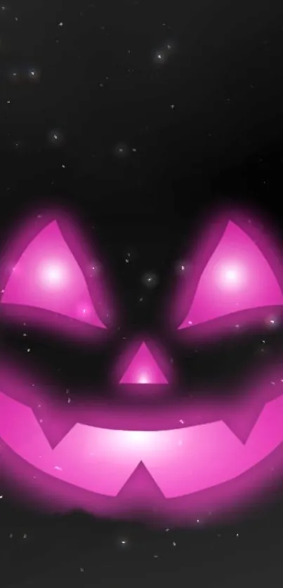 Pink glowing Jack-O'-Lantern on a black background with stars.