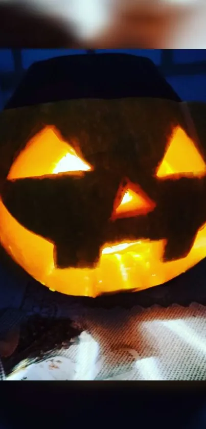 Glowing Jack-O'-Lantern on dark background, perfect for Halloween vibe.