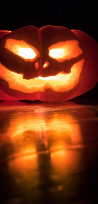 Glowing Jack-o'-Lantern on dark background, perfect for Halloween wallpaper.