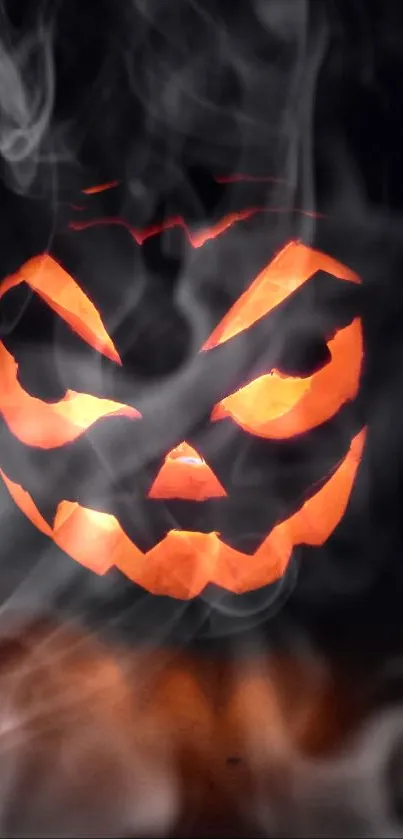 Eerie glowing jack-o'-lantern with orange light on a dark background.