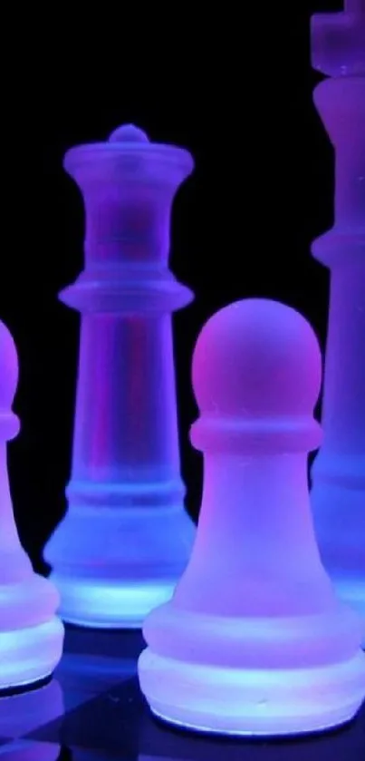 Neon chess pieces glowing in blue and pink on a black background.