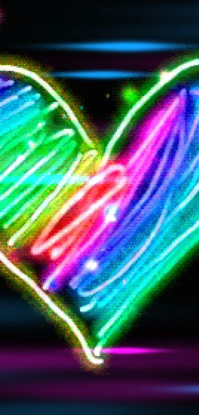 Colorful neon heart on a black background, glowing brightly.