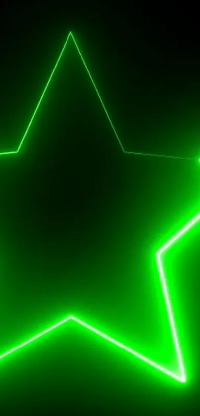 Glowing green neon star on dark background