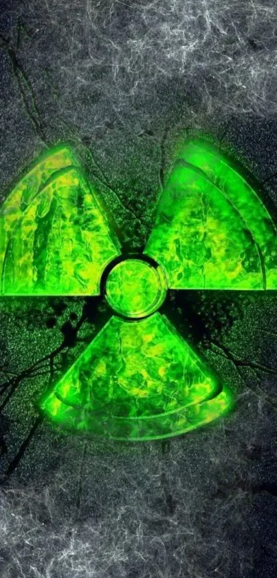 Glowing green nuclear symbol with dark background.