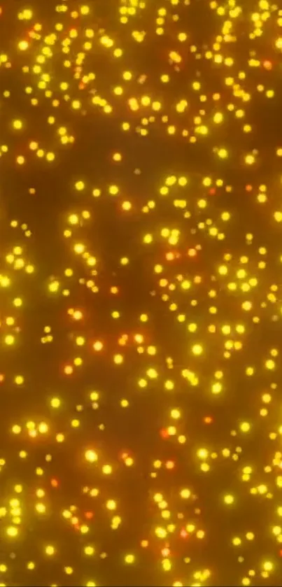 Orange glowing dots wallpaper with a vibrant, lively pattern.