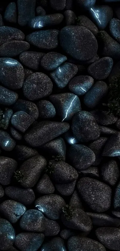 Glowing pebbles on dark background wallpaper.