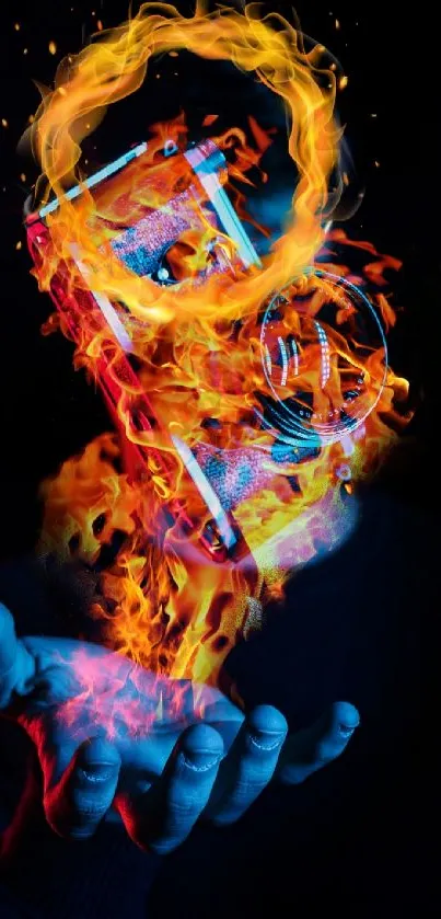 Hand holding phone engulfed in vivid blue and orange flames.