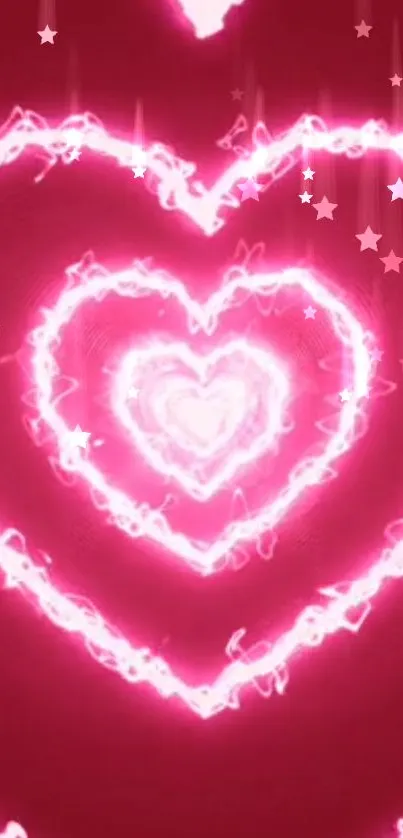 Vibrant pink wallpaper with glowing hearts and stars.