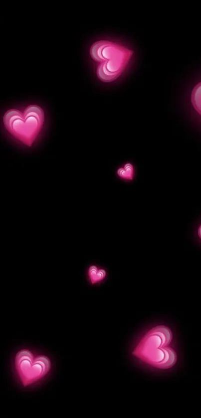 Mobile wallpaper with glowing pink hearts on a dark background.