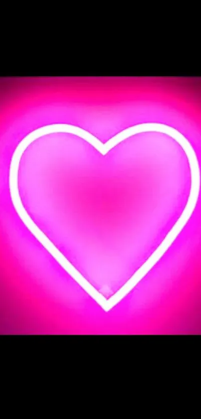 Glowing pink neon heart centered on black background.