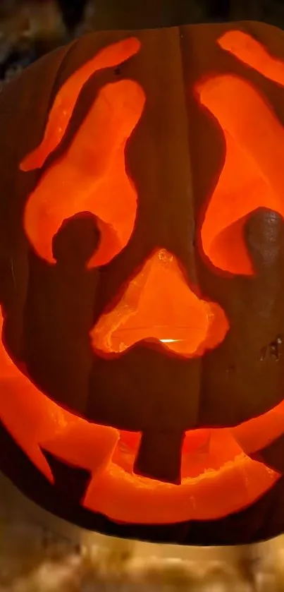A glowing carved pumpkin with a spooky smile, perfect for Halloween decorations.
