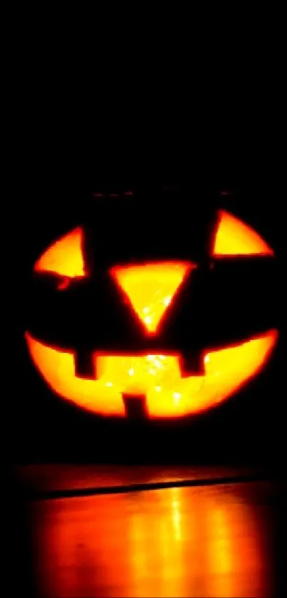 Glowing pumpkin with a dark background for Halloween.