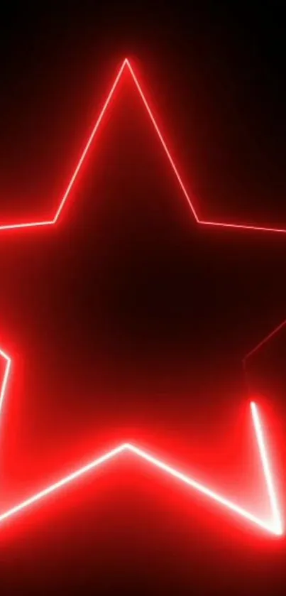 Glowing red neon star on a dark background.