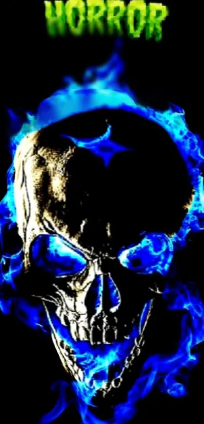 Eerie glowing skull with blue flames on black background.