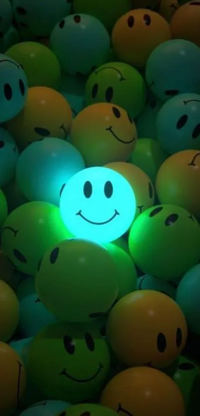 Neon green glowing smiley face among blue and yellow balls.