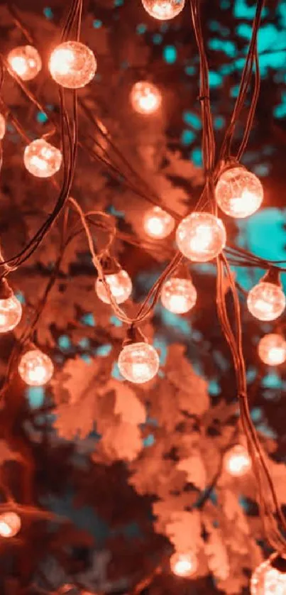 Aesthetic string lights against a teal leaf background.