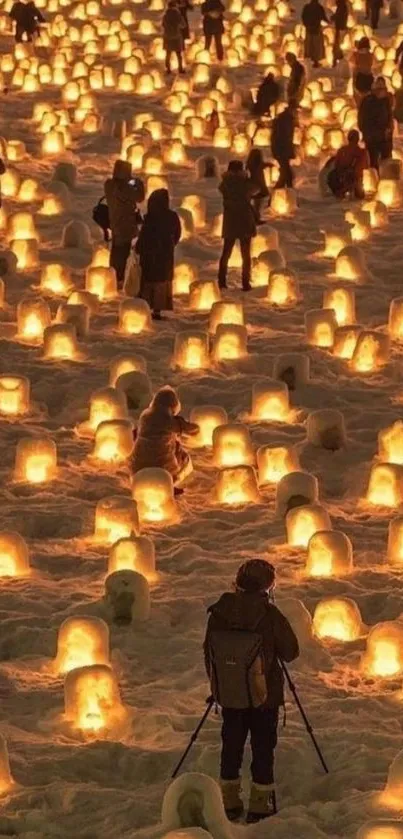 Winter landscape illuminated by glowing lanterns creating a serene atmosphere.