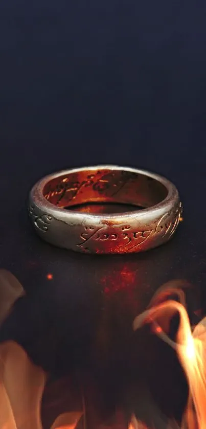 A gold ring encircled by vibrant flames on a dark background.