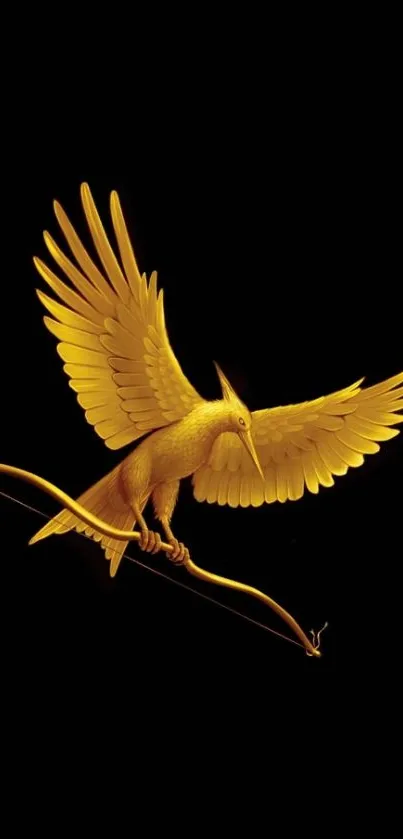 Golden bird in flight with wings spread wide on a black background.