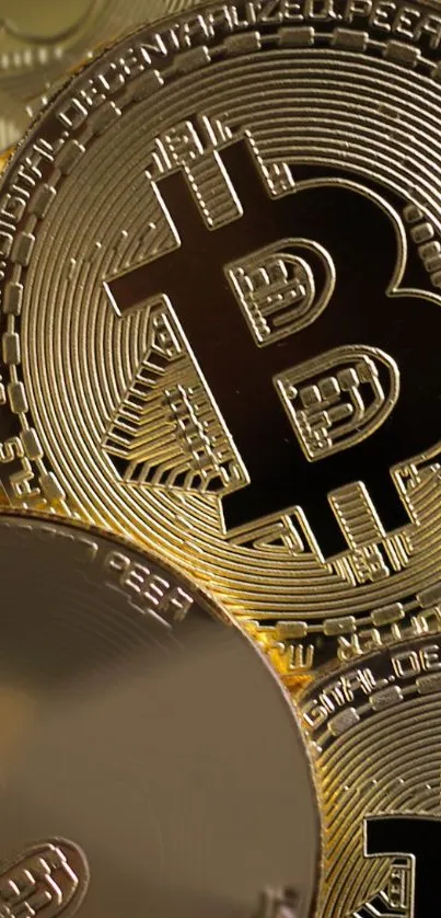 Golden Bitcoin coins wallpaper for mobile screens.