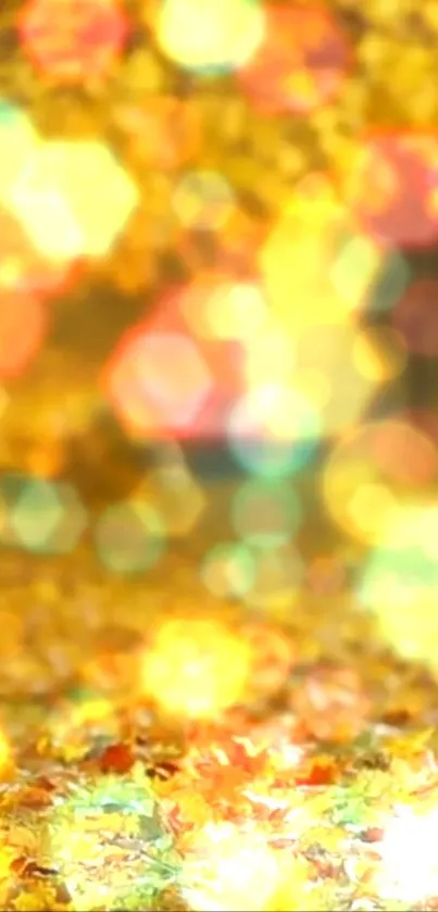 Golden autumn bokeh wallpaper with abstract leaves.