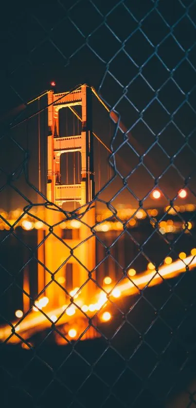 Golden Gate Bridge glowing at night through a metal mesh.