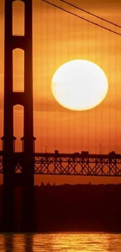 Golden sunset casting silhouette over a scenic bridge, reflecting on water.