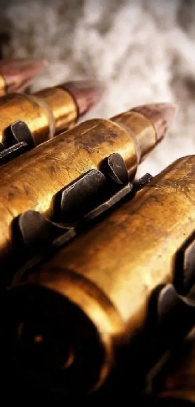 Close-up of golden bullets with metallic texture for phone wallpaper.