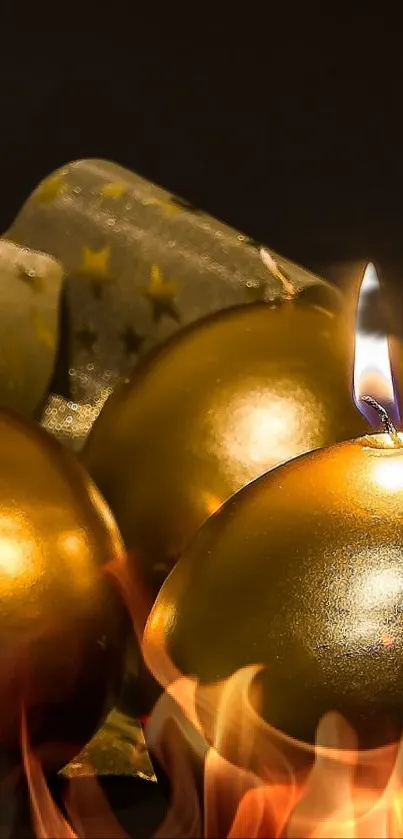 Golden candles with a glowing flame and decorative fabric.