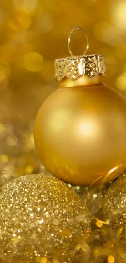 Golden Christmas bauble with glitter ornaments.