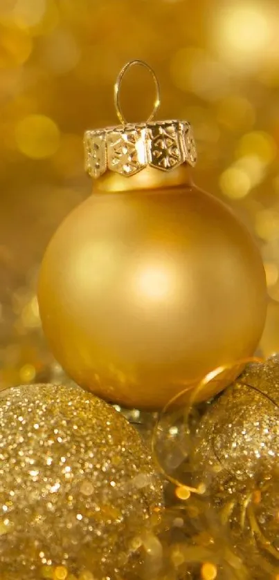 Golden Christmas ornament with glittering decorations.