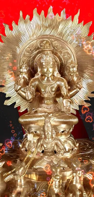 Golden deity statue with radiant design.