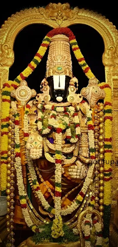 Golden Hindu deity with garlands wallpaper.