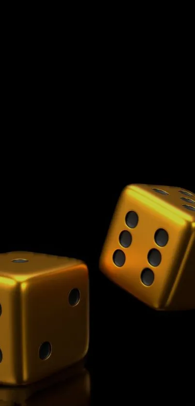 Golden dice on a black background wallpaper.