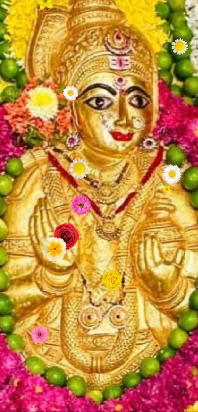 Golden deity with colorful flower garlands