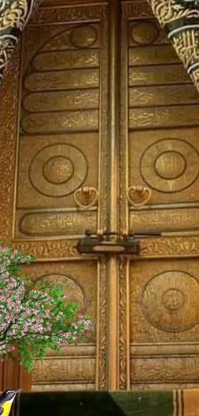 Golden door with ornate patterns and floral details in corner.