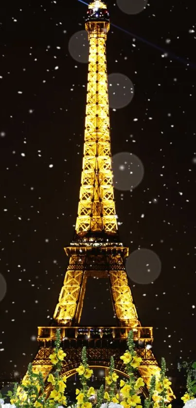 Golden Eiffel Tower with snowflakes at night.